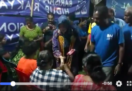 For giving away money to voters at a BN event in Taman Keladi on 23 April 2018, then claiming it was her allocation as a Senator when parliament was officially dissolved on April 7.